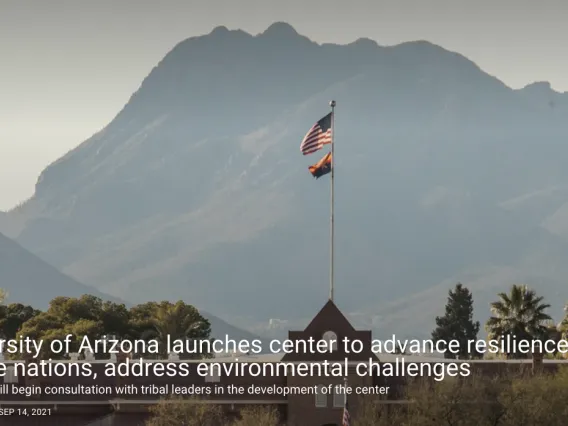 Mountain Landscape and a building flying an American flag