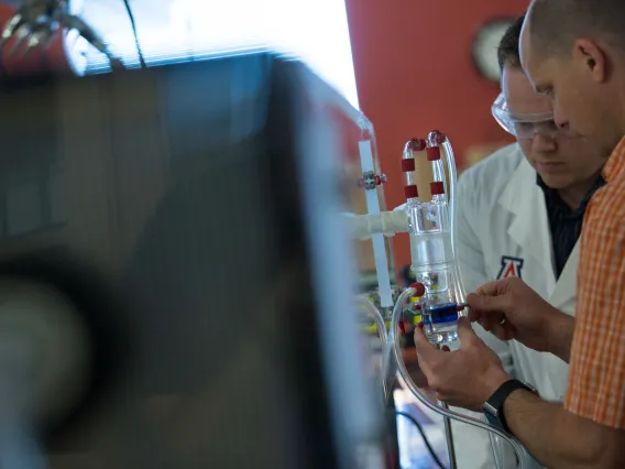 Two researchers working in a lab.