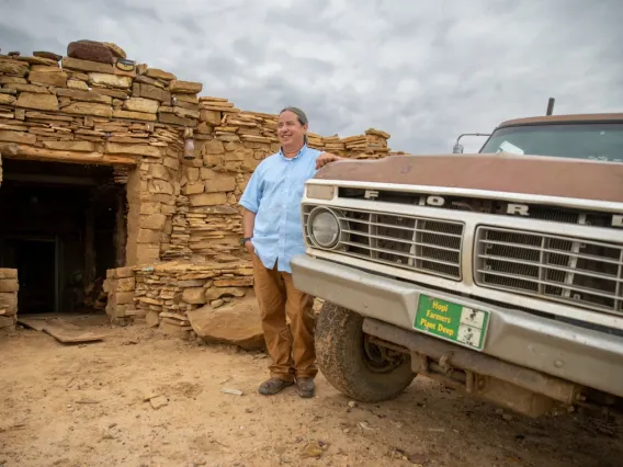 Michael Kotutwa Johnson outside his home near Kykotsmovi Village on the Hopi reservation in northeastern Arizona. Johnson joined the university this summer as an assistant specialist in the School of Natural Resources and the Environment, and is affiliated with the UArizona Indigenous Resilience Center.