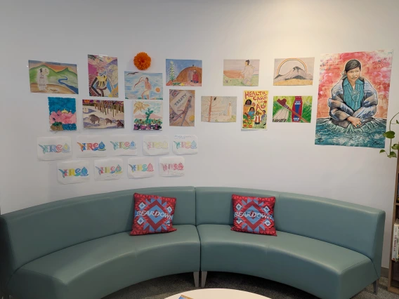 curved couch and wall decor