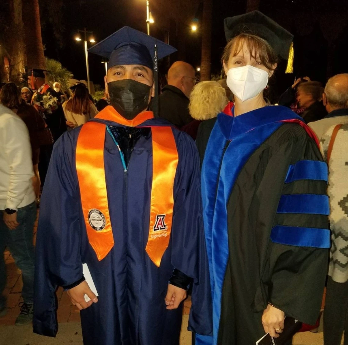 Manuelito Chief and Kelly Simmons-Potter at the 2021 commencement for The University of Arizona.