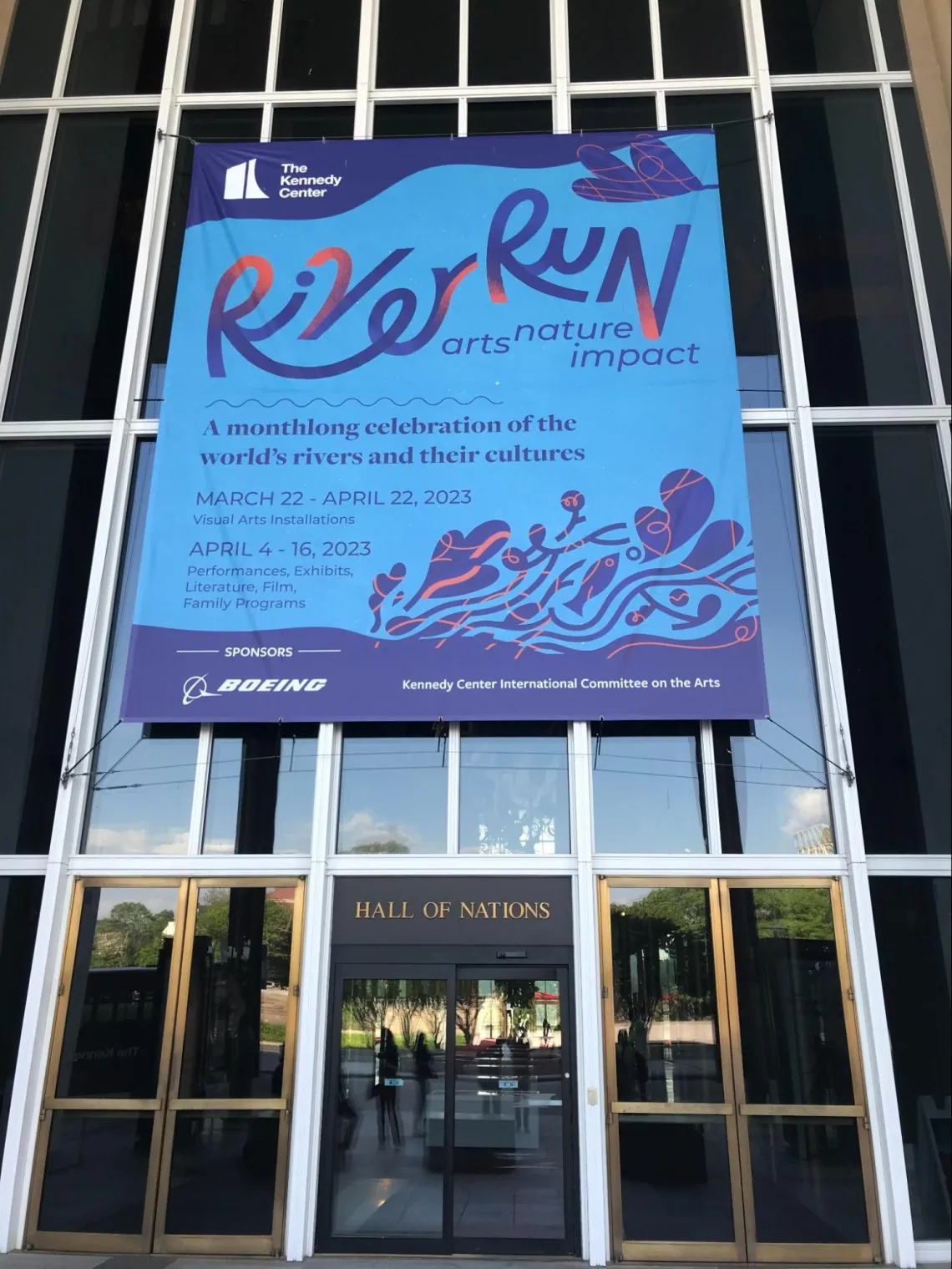 A banner announcing the 2023 RiverRun hangs above the entrance to the Kennedy Center for the Performing Arts.