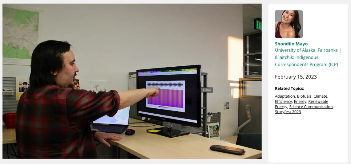 Bax Bond pointing at his computer screen to show an energy balancing model.