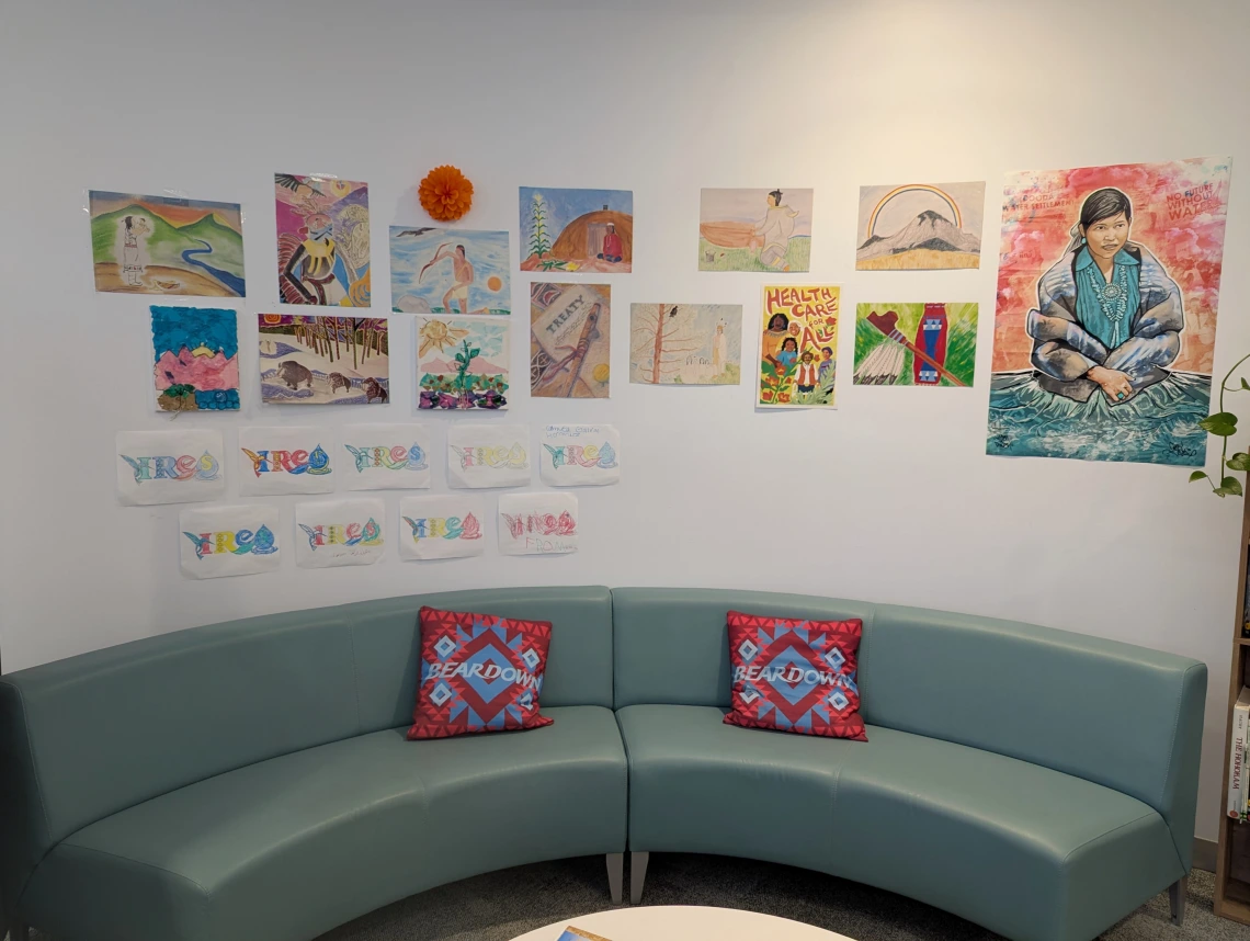 curved couch and wall decor