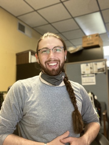 William Borkan smiles at his internship office