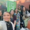 A selfie with ICP cohort and support posing at the 2025 Planet Forward Summit entrance
